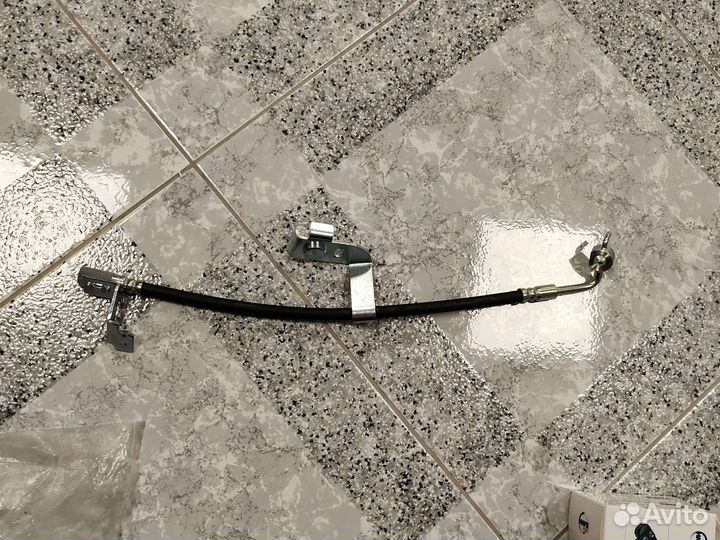 Тормозной шланг Ford Escort передний левый