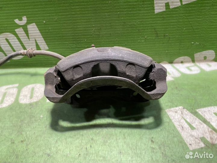 Суппорт тормозной передний правый Nissan March K11