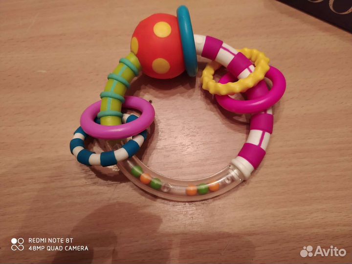 Игрушка-погремушка развивающая