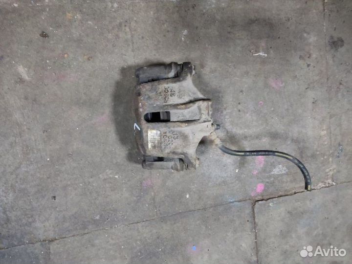 Суппорт тормозной передний левый Peugeot 206