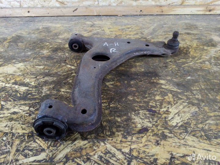 Рычаг подвески правый Opel Astra H