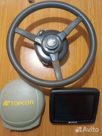 Автопилот на трактор Тopcon