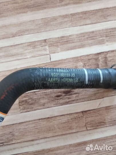 Патрубок системы охлаждения форд Мондео