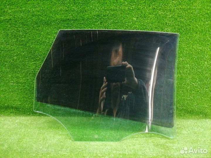 Стекло двери заднее левое Opel Astra J 2009-2012