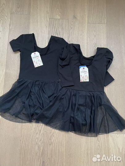 Новый костюм гимнастический р.134-140