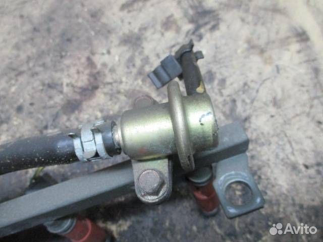 Форсунка топливная Mazda Demio DW 1999 195500-3020