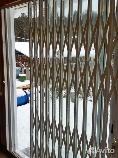 Решетки раздвижные на окна
