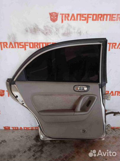 Стекло двери заднее левое Мазда Милления TA5P