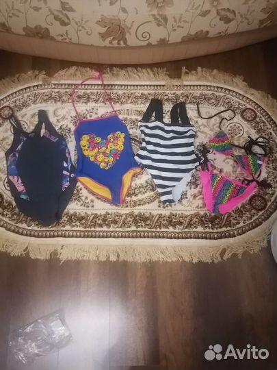 Купальникии новые и бу,7-11 лет