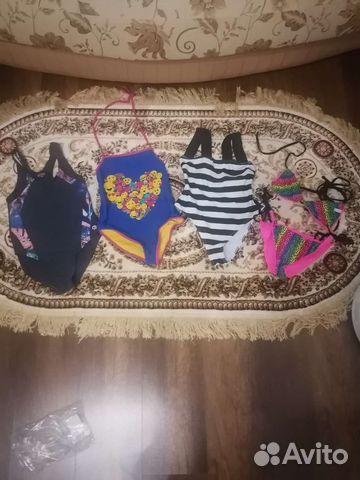 Купальникии новые и бу,7-11 лет