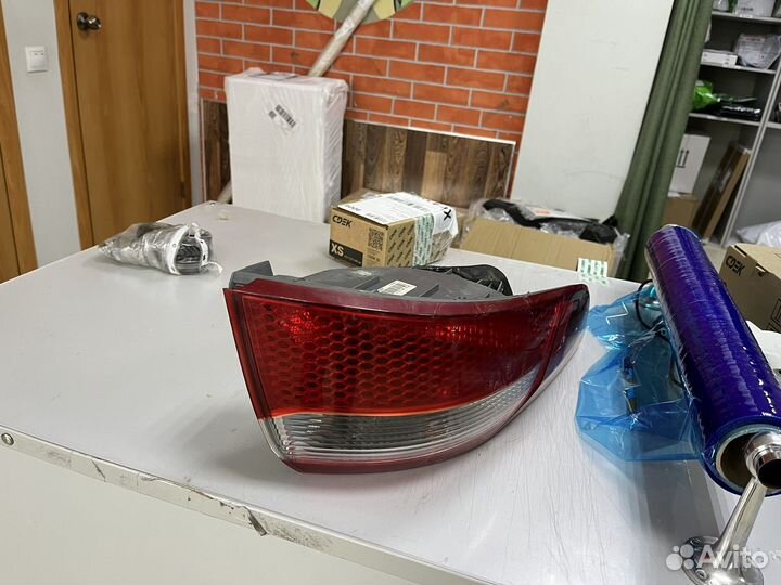 Фонарь левый Kia rio 3 оригинал