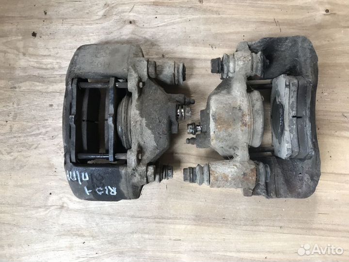 Суппорт передний левый, правый Kia Rio 1