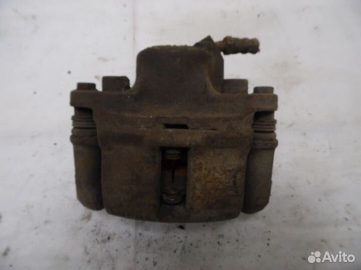 Суппорт тормозной передний левый Renault Logan 1 2