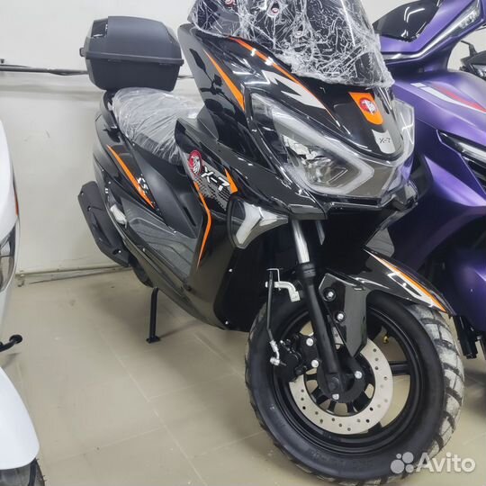 Макси скутер