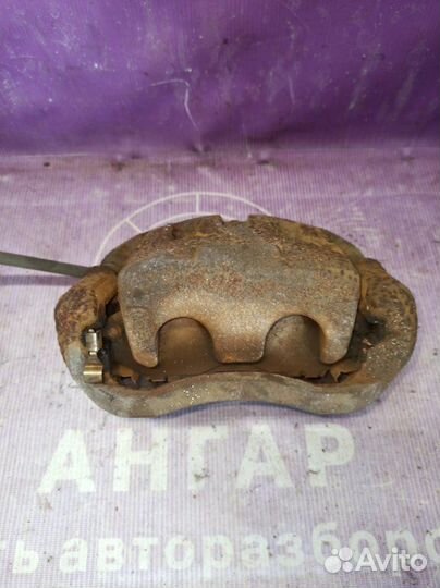 Суппорт тормозной передний правый Renault Koleos