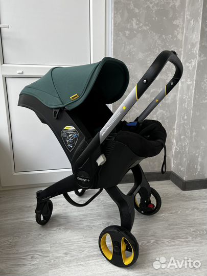 Коляска автокресло doona с базой isofix