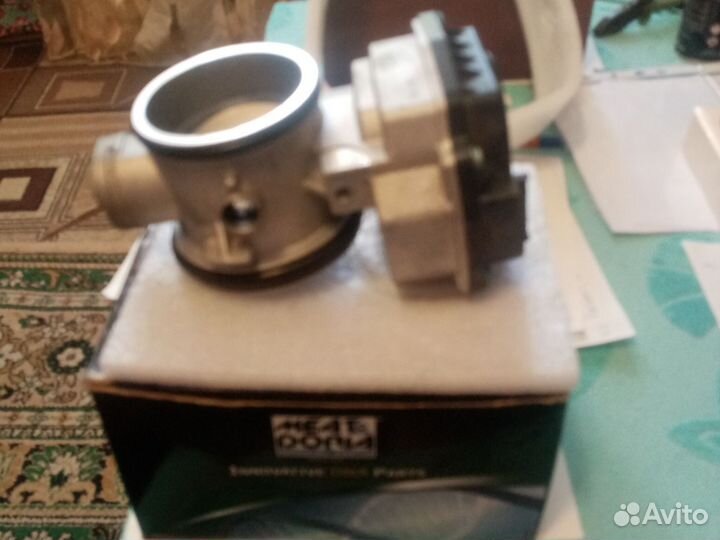 Дроссель электронный на Nissan almera g 15