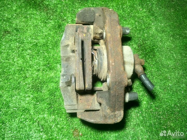 Суппорт тормозной правый Opel Vectra A