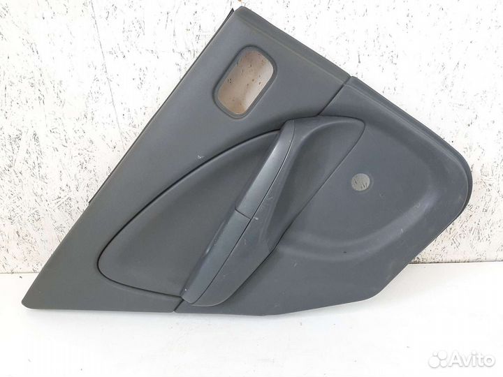 Обшивка двери задняя левая Nissan Almera Classic
