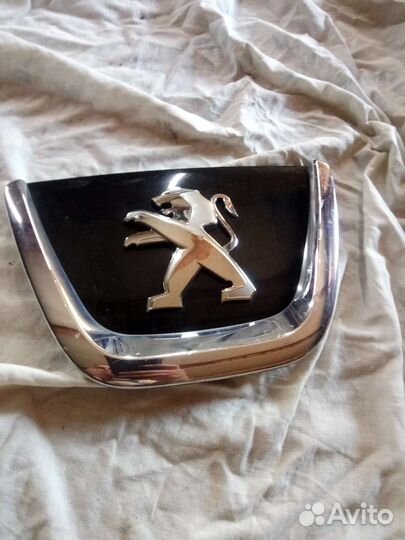 Логотип peugeot