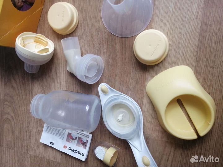 Молокоотсос ручной medela + соска medela calma