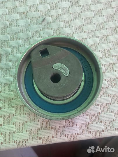 Натяжитель ремня грм