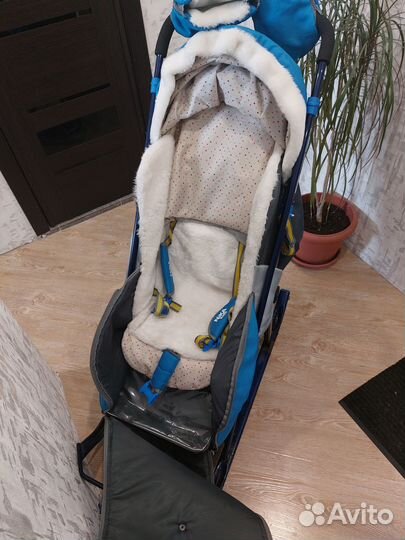 Зимняя коляска-сани