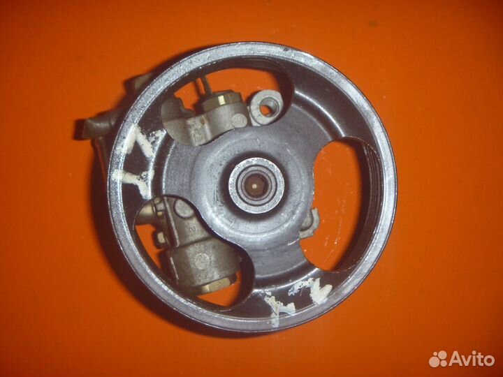 Насос гидроуселителя мазда ZY