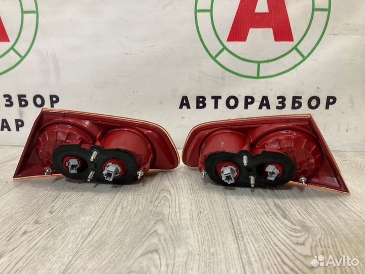 Фонарь в крышку багажника задний Mitsubishi Lancer