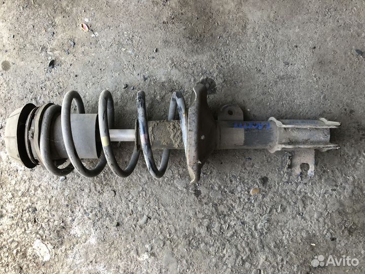 Амортизатор передний левый Шевроле Лачетти