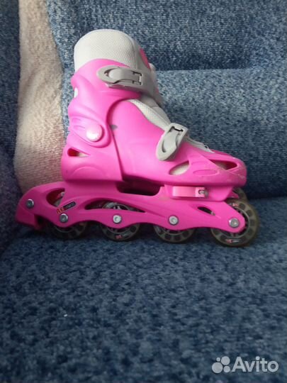 Роликовые коньки