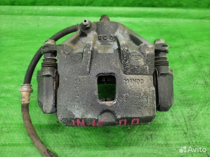 Суппорт передний правый Tucson / Sportage 04-10