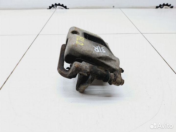 Суппорт задний правый Toyota Highlander II (XU40)