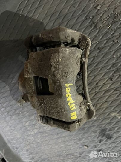 Тормозной суппорт передний Chevrolet Lacetti