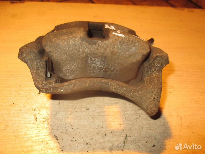 Суппорт передний левый (Renault Logan)