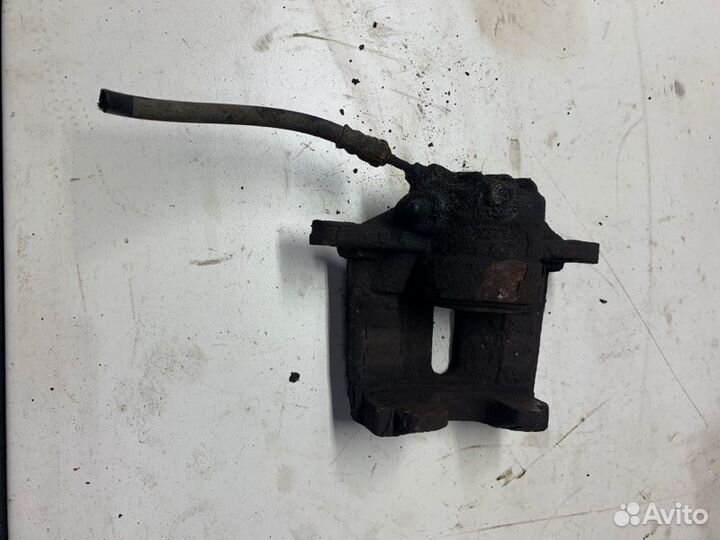 Суппорт тормозной передний левый Peugeot 207 coupe