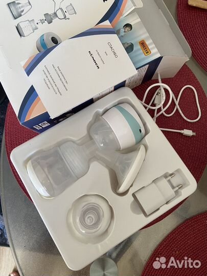 Молокоотсос электрический новый