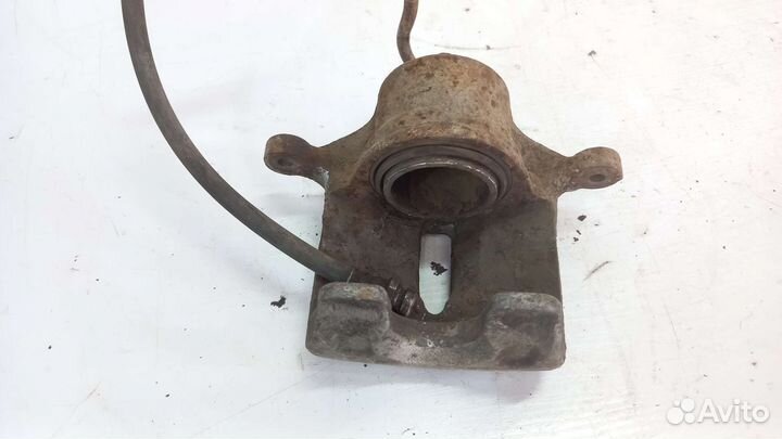 Суппорт передний левый Hyundai Tucson 2