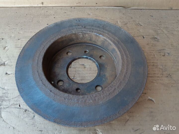 Диск тормозной задний Ниссан Примера П10 1990-1996
