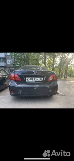 Задний бампер toyota corolla 2008