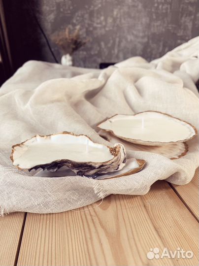 Свеча в раковине морского гребешка