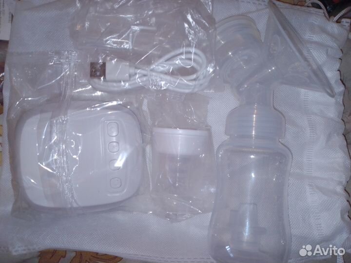 Молокоотсос электрический новый