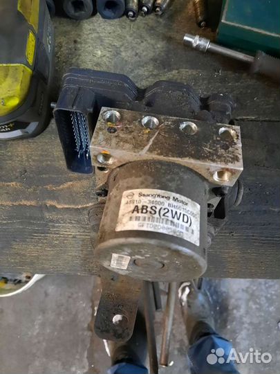 Блок абс санг йонг актион нью