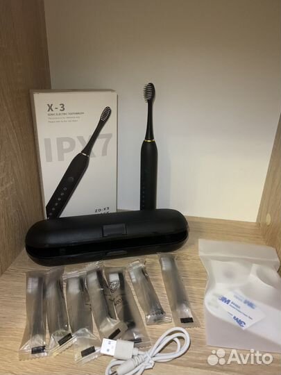 Электрическая зубная щетка новая