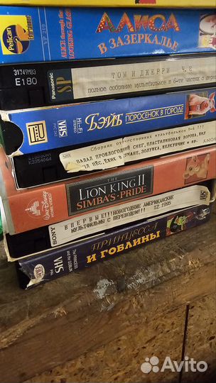 Коллекция фильмов и мультфильмов на VHS кассетах