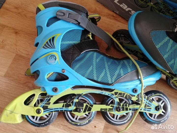 Роликовые коньки