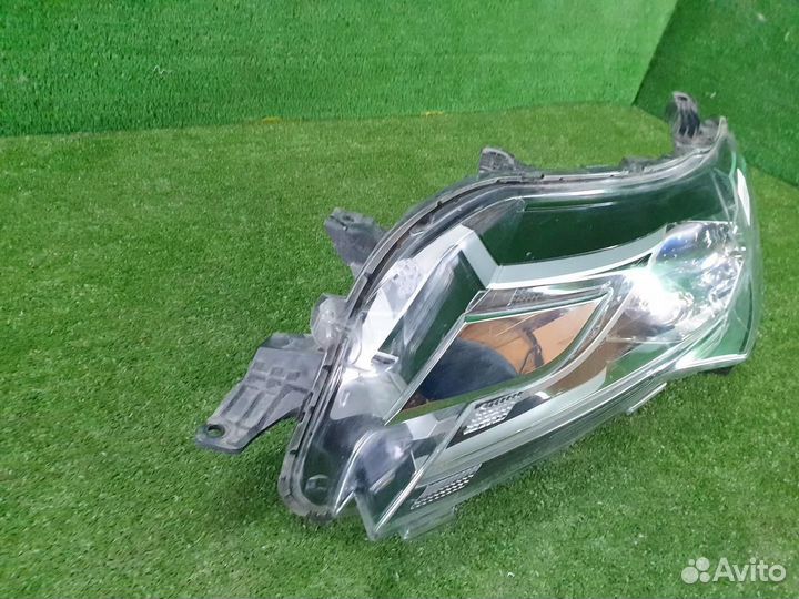 Фара левая Mitsubishi Pajero Sport