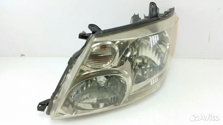 Фара левая Toyota Alphard MNH10