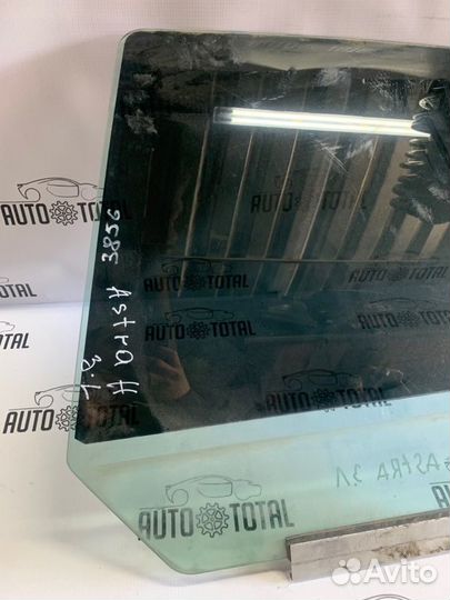 Стекло двери заднее левое Opel Astra H