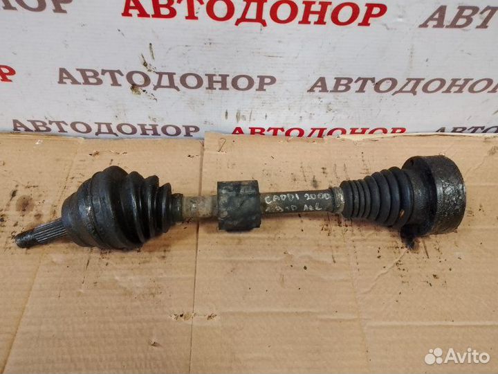 Полуось привод передний левый Volkswagen Caddy